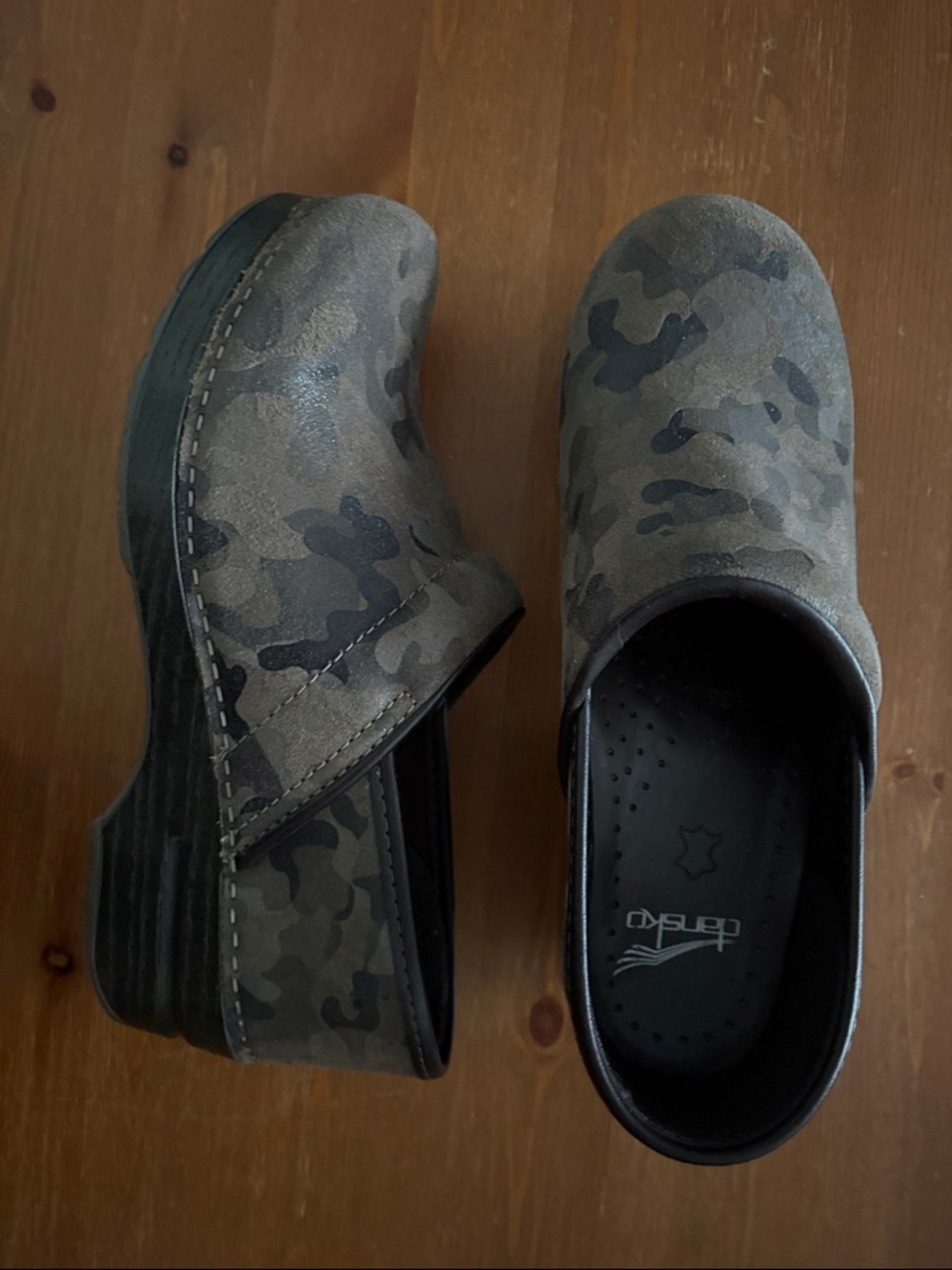 Dansko women’s Camouflage Clogs in Olive and Dark Green